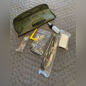 Army surplus novelty gun cleaning kit.